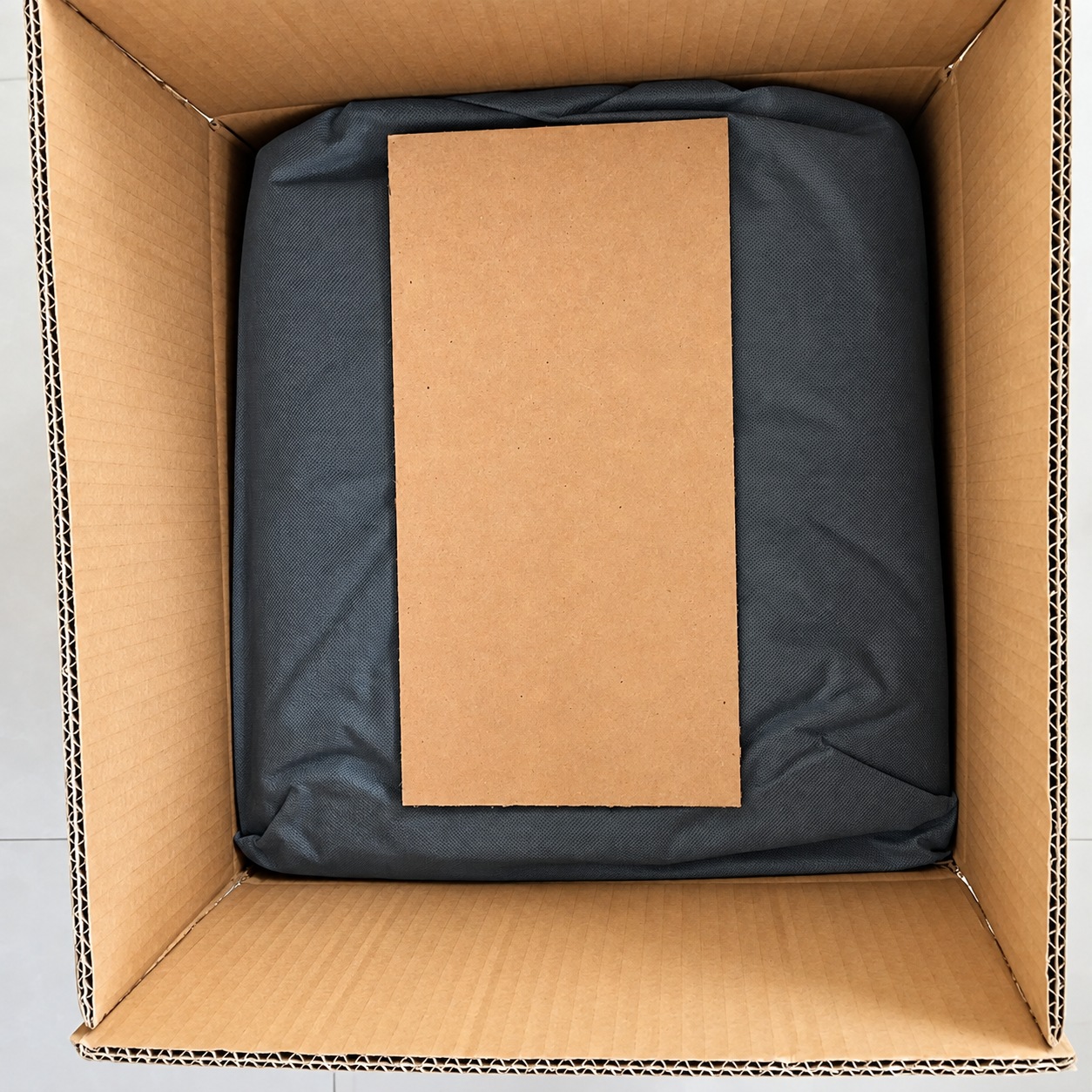 Open-carton packing concept with a folded bag and insert.
