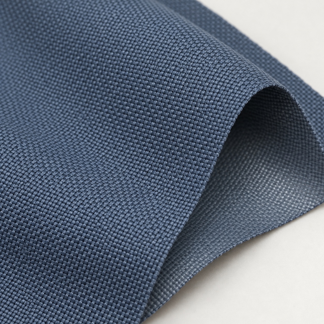 AI-generated slate-blue regular Oxford bag fabric appearance reference