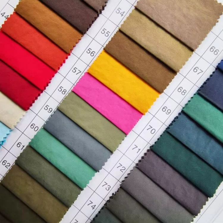 Rows of crinkled fabric swatches in assorted colors on a numbered sample card.